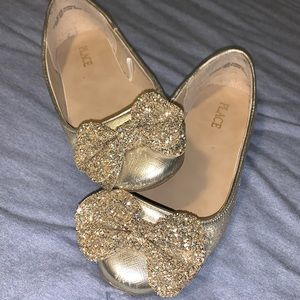 Glittery gold shoes